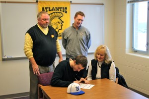 Christensen signs his letter of intent to play baseball with NIACC. NIACC was his first choice of where to play baseball after high school. His goal after NIACC is to go play for a Division 1 school.