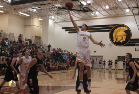 “Big Team Win” for Trojan Boys Basketball