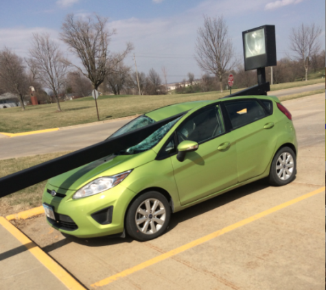 A teacher's 2013 Ford Fiesta was damaged by a falling light pole in the AHS parking lot on Wednesday. Photo by AHS journalist Brecklyn Carey.
