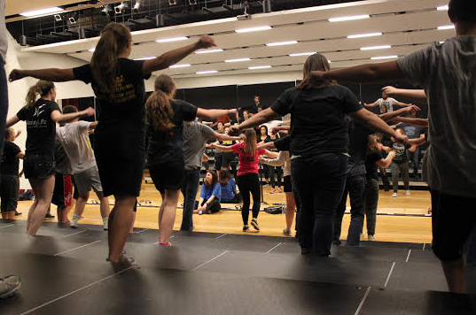Students practice their 2014-2015 show choir set.  They have six songs in this years show.