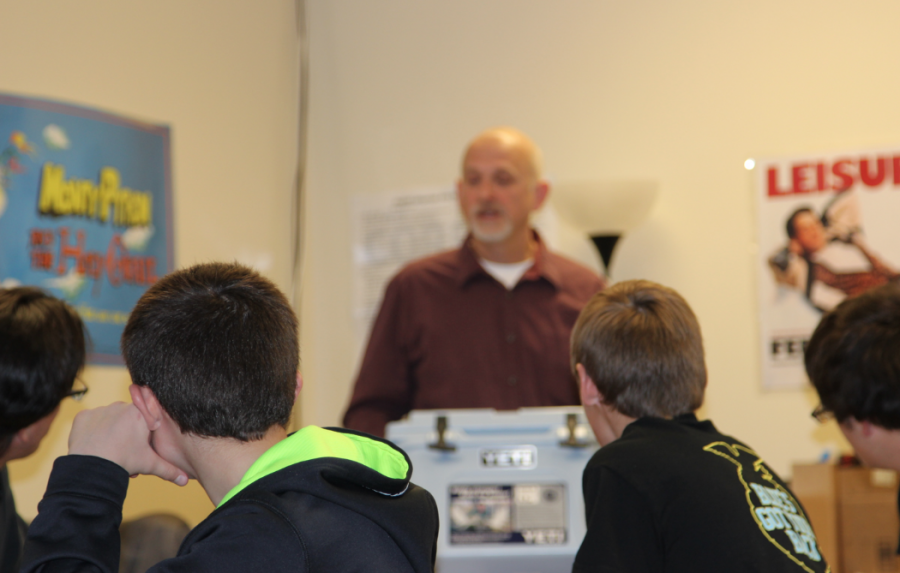 Students listen to a guest speaker present at Atlantic High Schools Career Day event. 