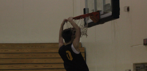 Trojan Boys Defeat Panorama at Corning Basketball Jamboree