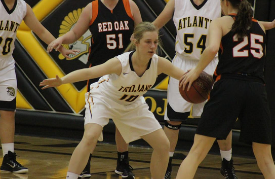 Sophomore Megan Behrends actively plays defense on varsity.