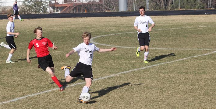 2015 Senior Zach Brooks kicks the ball upfield during a game. Brooks graduated in the class of 2015. (File Photo 2015)