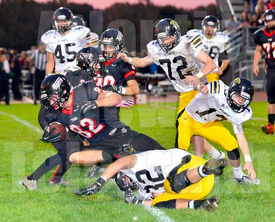 Photo credit: Atlantic News Telegraph. Junior Drake Roller makes a tackle against ADM. Roller started every game this season. 