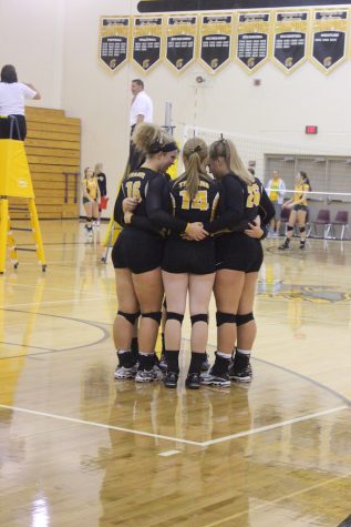 Trojans Fight to the Finish Against Harlan
