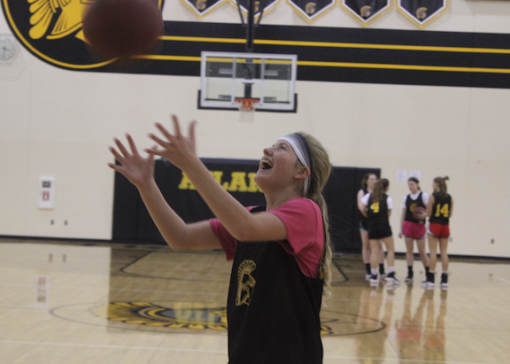 Sophomore Baylee Newell catches the ball during practice. Newell Currently leads the team with 30 points. 