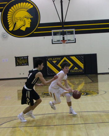Sophomore Chase Mullenix drives up in the lane seeking a score in a game at home versus Glenwood