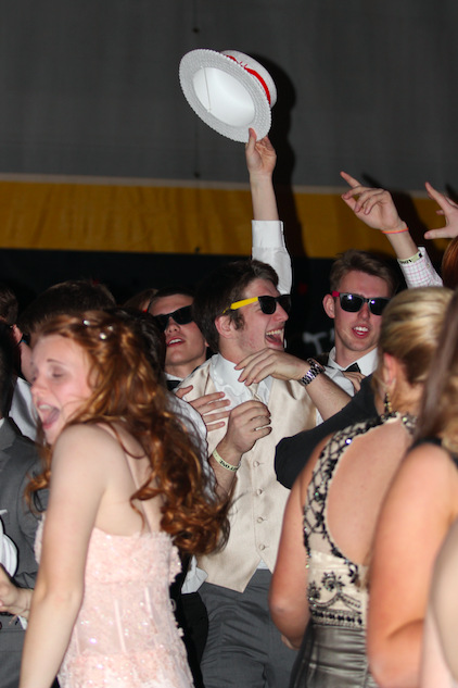 MADE IN THE SHADE - Zac Stork gets in the groove at the 2016 Junior-Senior Prom. Atlantics prom has been closed for at least 27 years. Principal McKay said the intent of a closed prom is a final hurrah for the senior class.