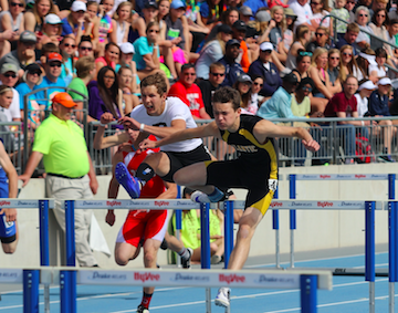HAVIN A GRATT DAY - Gratt Reed flies over the 110 high hurdles at the 2016 State track meet.