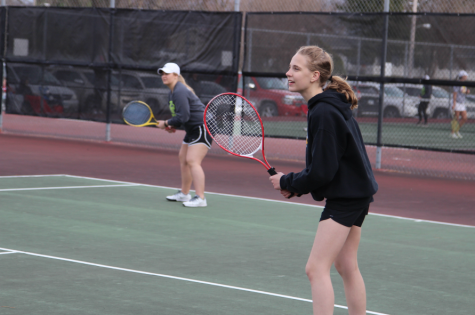 Trojan Tennis Takes on the Knights