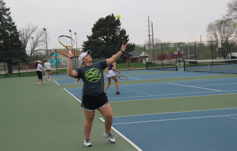 Trojan Tennis Plays Denison Monarchs