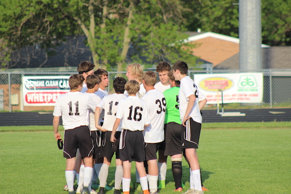 The boys get pumped up before the first out of three games in one week.