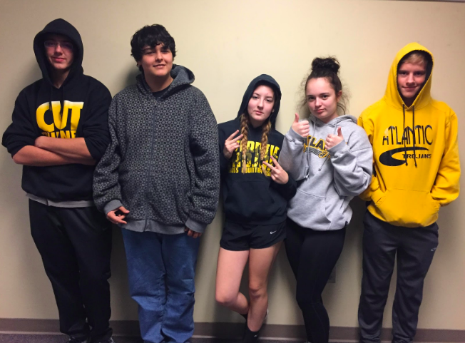 AHS students give examples of how to wear a hoodie correctly. Other students show how to wear it incorrectly, which makes it a violation of the dress code.