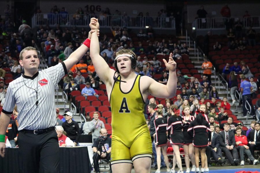 HEART OF A CHAMPION - Senior John McConkey gets his hand raised to signal he has won the State title. McConkey won his match with a final score of 7-6 against Spencer Trenary of Clarion-Goldfield-Dows. 