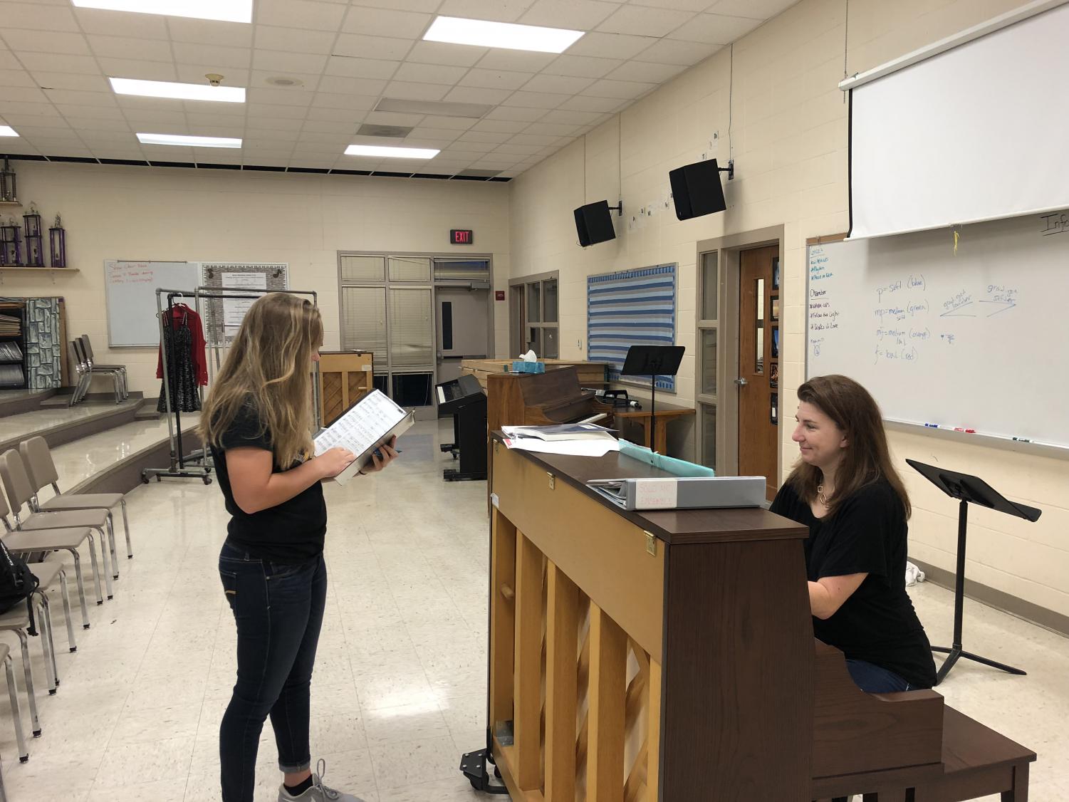 DO RE MI - Sophomore Olivia Engler practices with choir director Jennifer Gaesser. Students planning to audition have to practice up to 13 different songs.