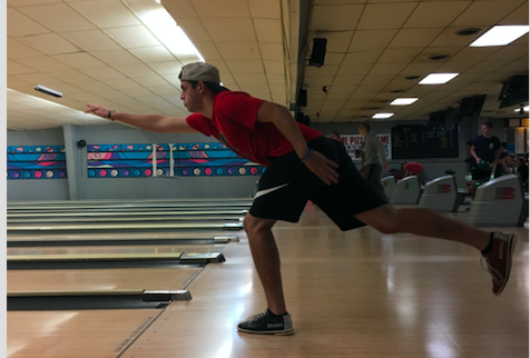 Sam Granner bowls with the football team on Thursday night.