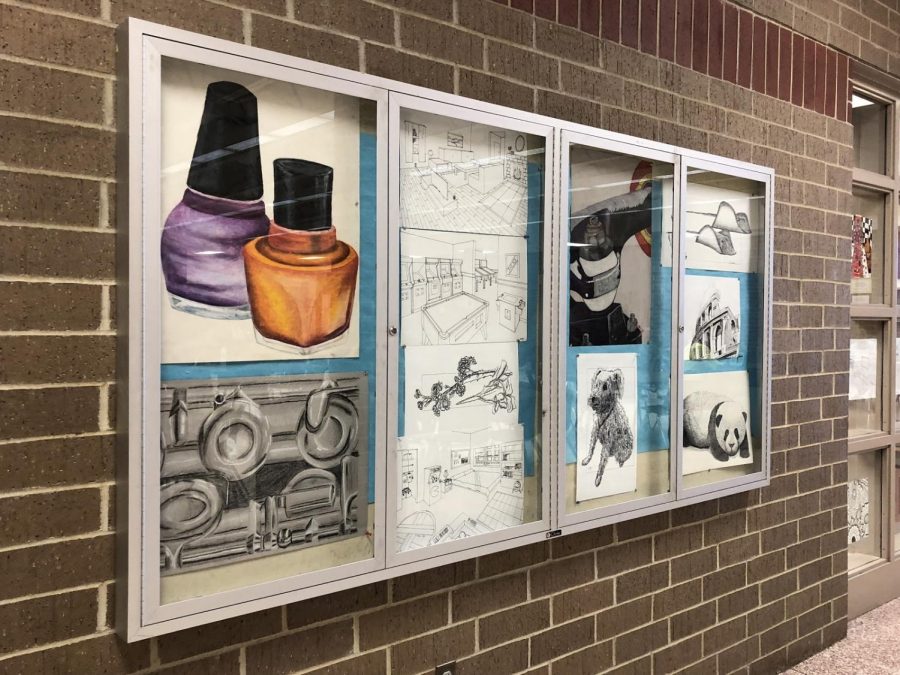 The artwork by students of all levels of art can be seen by the media center. 