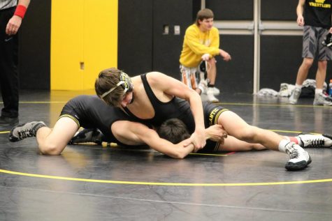Trojan Wrestlers Face-Off for Varsity Positions
