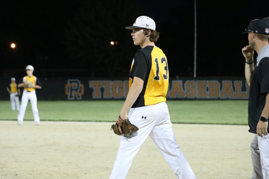 LOOK CLOSE -- Senior Chase Mullenix turns his attention towards the game. Mullenix has played an active role in the athletic program during his years of high school, participating in football, basketball, wrestling, track and baseball.