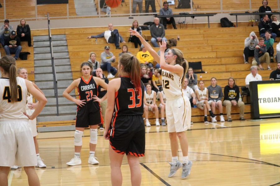 READY, AIM, THROW - Sophomore Haley Rasmussen takes a free throw during a game. This will be Rasmussen's second year playing for the Trojan girls.