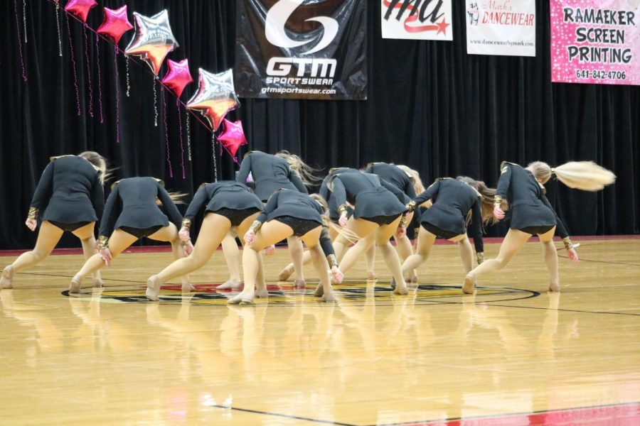 IN SYNC - The 2017-18 dance team performs one of their routines. They often danced at half-time during basketball games in the winter season.