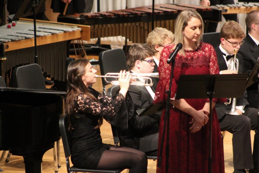 SWIBA READY -- Junior Erin Barrick gets ready for her upcoming honor bands with a solo at the winter concert while English teacher Emma Bireline narrates the piece called The Divine Comedy.