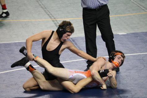 Trojans Bring Dual Record to 10-0