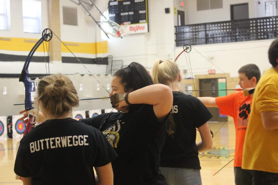 READY, AIM, FIRE - Sophomore Lea Lillard draws back her arm to make a shot.