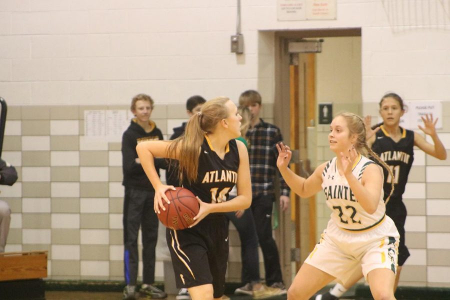 Sophomore Maycie Waters holds the basketball where the opposition cant reach it. Waters started JV against St. Albert on Thursday night.