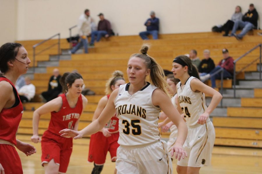 Junior Corri Pelzer guards her girl during the game against Treynor. Pelzer currently leads her team in rebounds with 94. Against Treynor, she grabbed three boards.