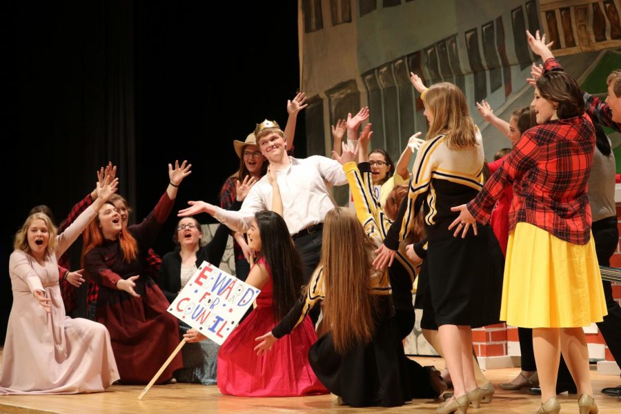 EDWARD FOR COUNCIL- Many cast members perform a scene during the 2018 spring musical. The musical was titled Big Fish, and featured graduate Josh McLean as one of the lead roles.