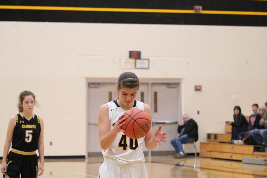 Senior Heidi Williams focuses before shooting a free throw in a scrimmage earlier this season. Against Harlan, Williams had nine boards and three steals.