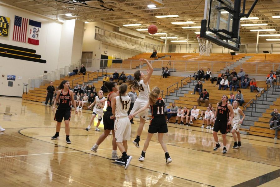 Sophomore Alyssa Derby goes up for two against Red Oak. In Friday nights varsity contest, Derby scored three points.