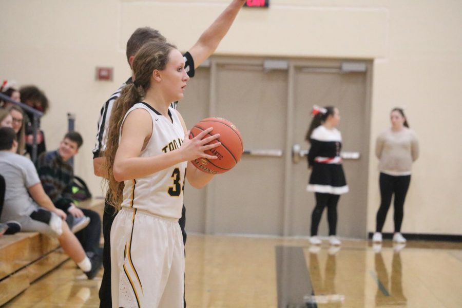 Junior Kenzie Waters prepares to inbound the ball to her teammates. In Friday night's contest, Waters put up six points.