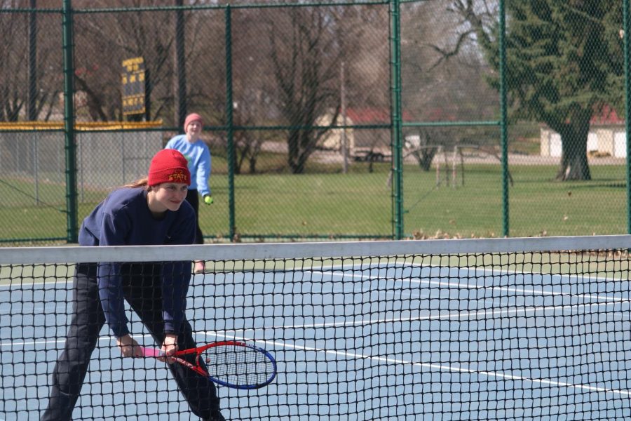 SHARP FOCUS - Sophomore Nellie Grooms keeps a straight face during her doubles match with sophomore Molly McFadden. 
