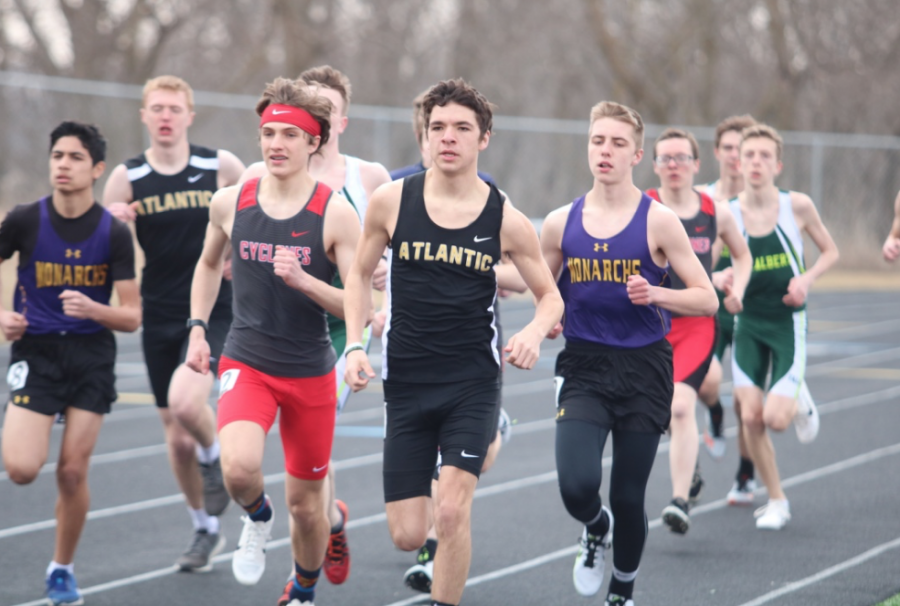 INCHING AWAY -  Senior Jalen Petersen creeps into the lead position during the 3200m run at the Denison meet. Petersen took first during that race and again in Harlan.