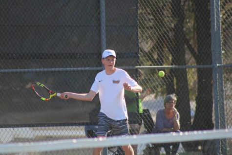 Falcons Outlast Trojan Tennis