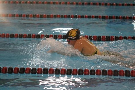 Trojan Girls Swim Rallies Against CB Abraham Lincoln