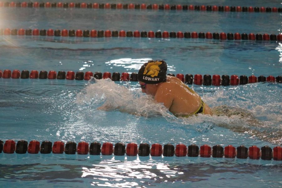 Senior Anna Lowary comes up for breath during her race on Tuesday. Lowary won all four of the events she participated in against Abraham Lincoln.