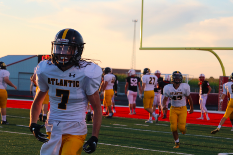 Cardinals Crush Trojans on the Football Field