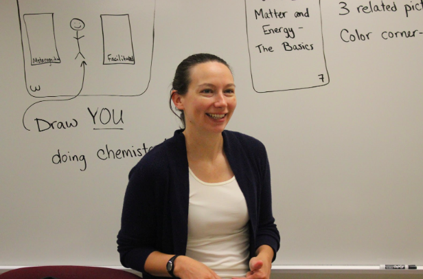 Science teacher Valerie Jaehrling smiles while teaching a lesson. Besides general chemistry, Jaehrling teaches AP chem and physics.