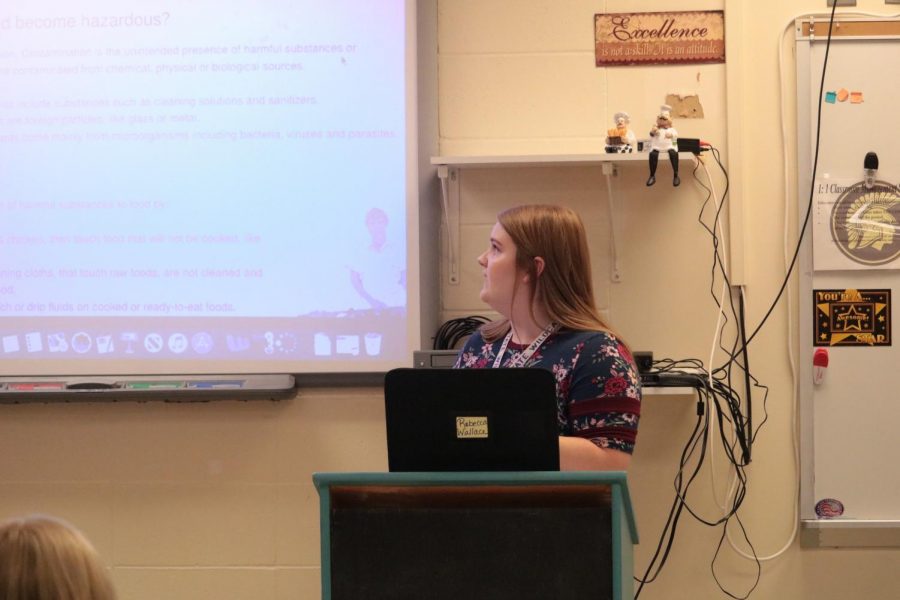 FCS teacher Rebecca Wallace goes through her presentation in the first week of school. Wallace student-taught in Germany en route to graduating from Iowa State University.