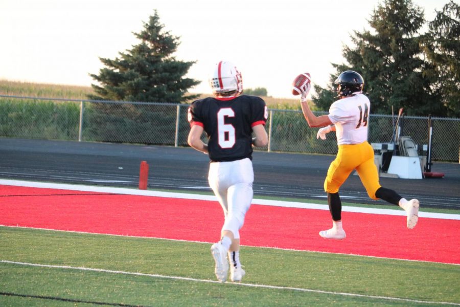 Senior+Tyler+Moen+takes+it+to+the+house+against+Creston+earlier+in+the+season.+Moen+has+played+football+all+four+years+of+high+school