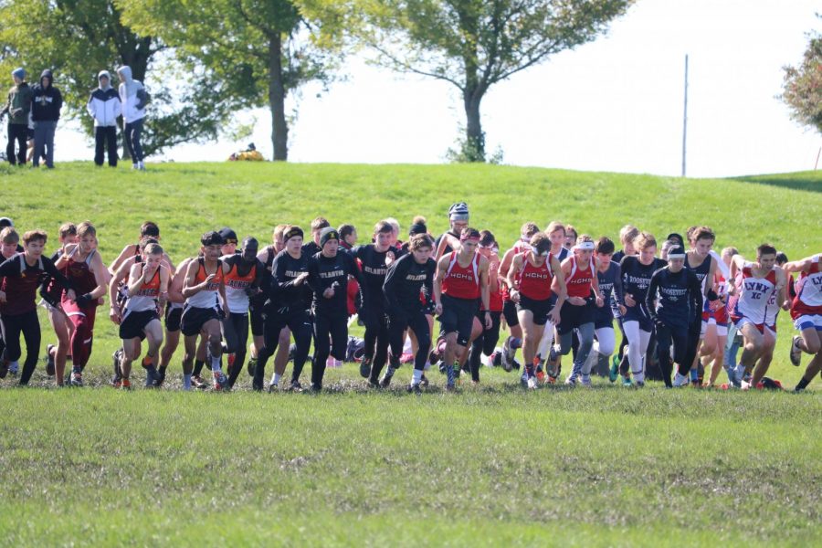 The varsity boys team starts the race at the home meet this past Saturday. The boys earned sixth place, and the girls finished in seventh.