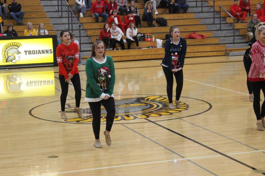 The dance team performs at halftime of the boys basketball against Kuemper last year. This was the only performance for the dance team last year. 
