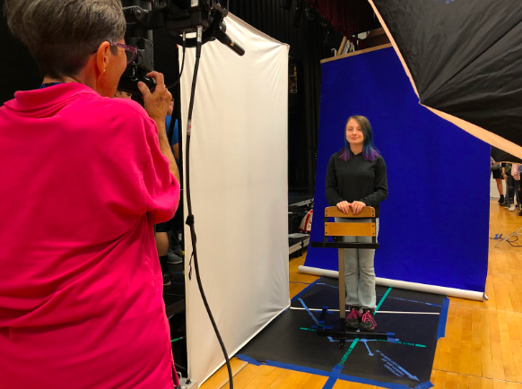 Freshman Trinity Christensen gets her photo snapped on Monday. 