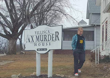 Junior Sydney Sanny gets ready to enter the Villisca Ax Murder house. Sanny visited the attraction in middle school.