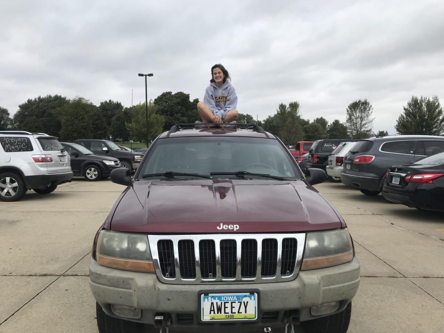 Junior+Anna+Wieser+pops+a+squat+on+top+of+her+Jeep%2C+Richard.