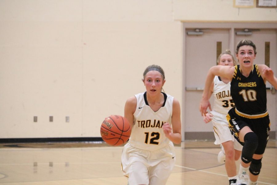 Junior Haley Rasmussen races down the court last season. Rasmussen has played on the varsity team since her freshman year.